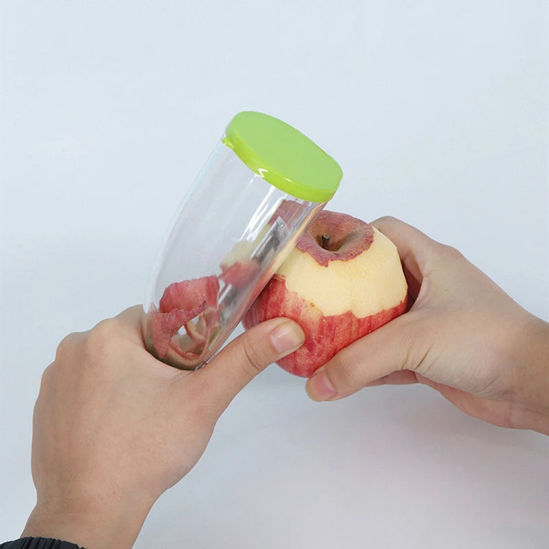 épluche légume avec storage et pomme