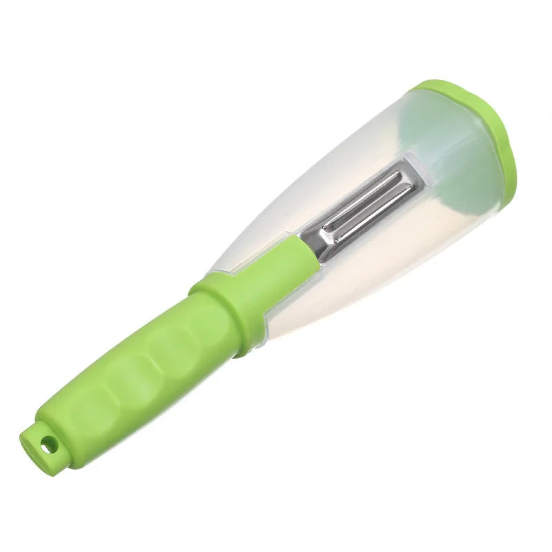 épluche légume avec storage vert