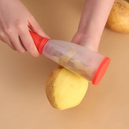 épluche légume avec storage et patate