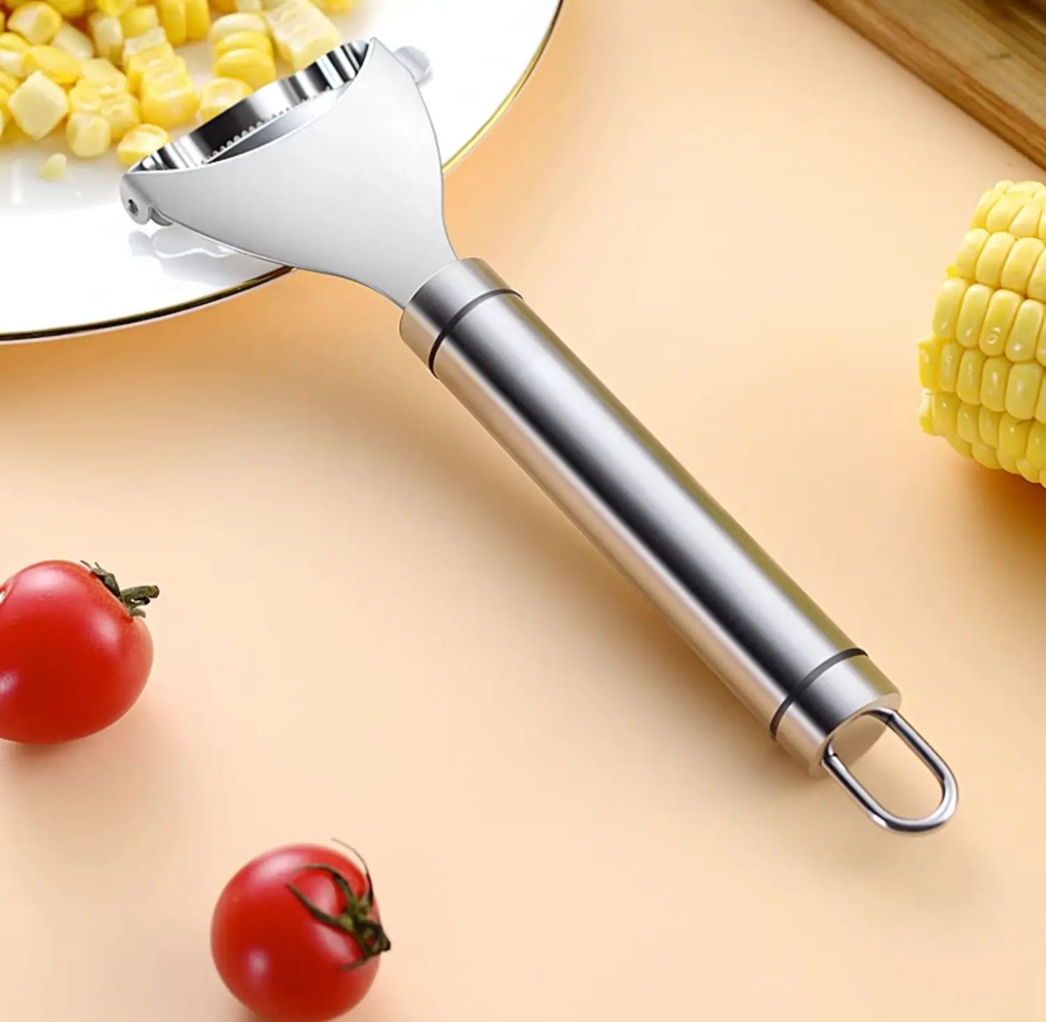éplucheur de mais avec tomate