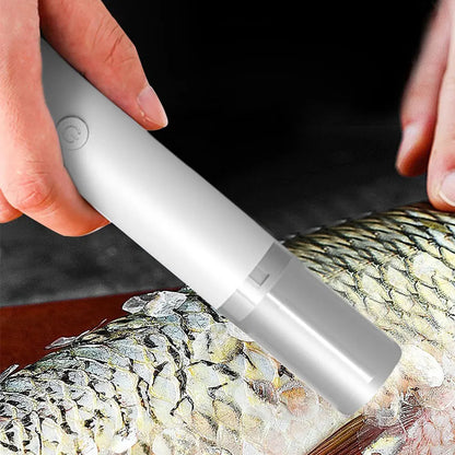 éplucheur de poisson électrique en action